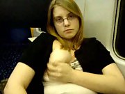 Masturbating with a vibrator on a public train